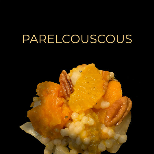 Vegan parelcouscous met pompoen, venkel, sinaasappel en pecan noten.